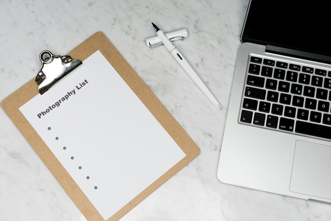 Printed survey questionnaires and pen on a desk
